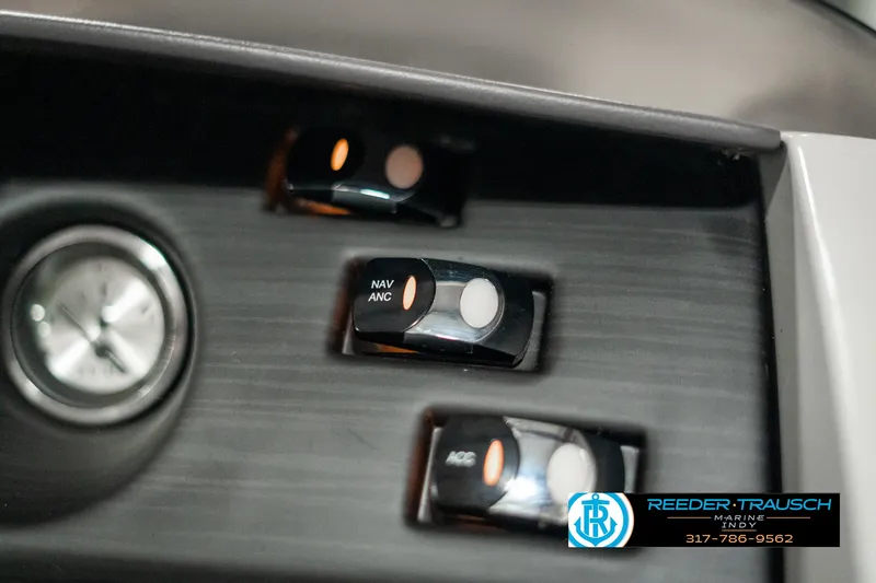 Slide: The Image of Control panel of 2022 Bennington 22 LSB boat with switches and gauge. - 34