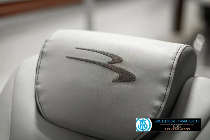 Slide: The Image of 2022 Bennington 22 LSB boat seat with embroidered logo, Reeder-Trausch Marine branding. - 39