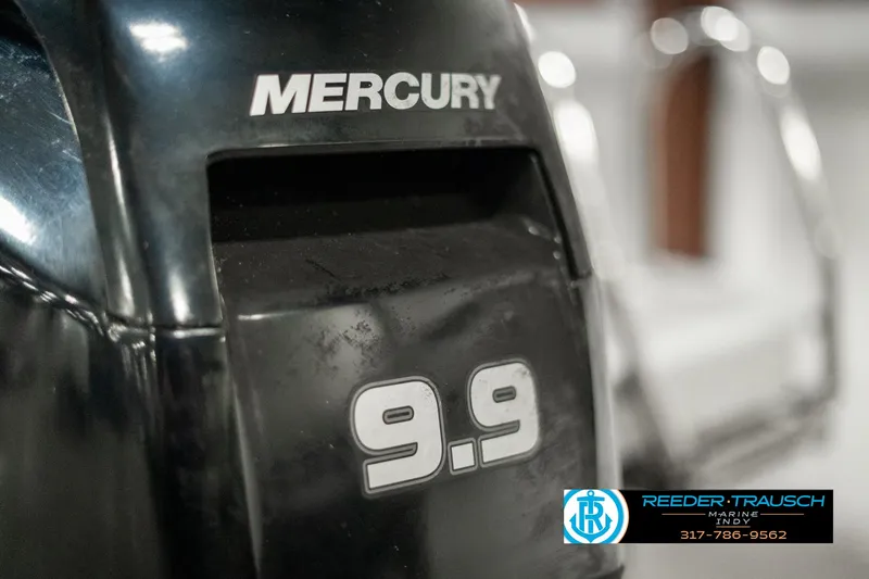 Slide: The Image of Mercury 9.9 outboard motor on 2022 Bennington 22 LSB boat. - 45