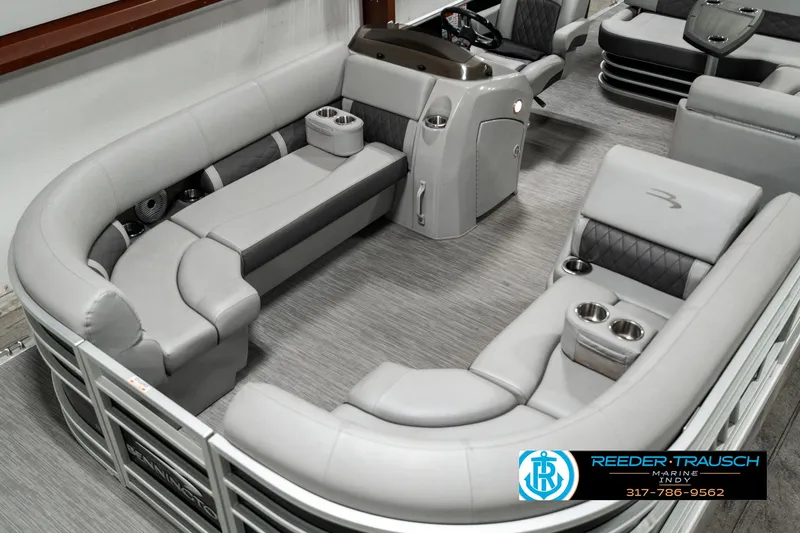 Slide: The Image of 2022 Bennington 22 LSB pontoon boat interior with gray seating and modern design. - 8