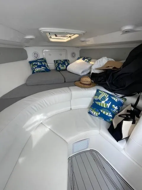 Slide: The Image of Interior of 2008 Intrepid Cuddy boat with cushions and nautical decor. - 9