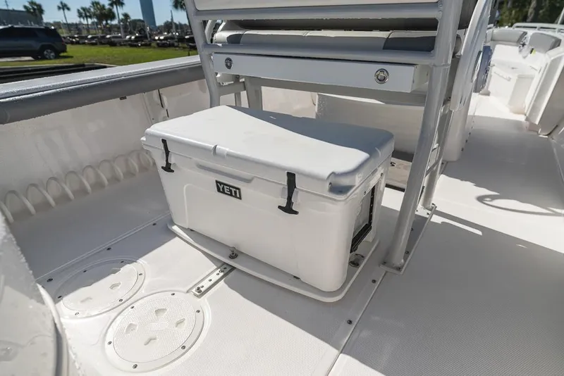 Slide: The Image of 2023 Everglades 243cc Sport Station boat with Yeti cooler on deck. - 22