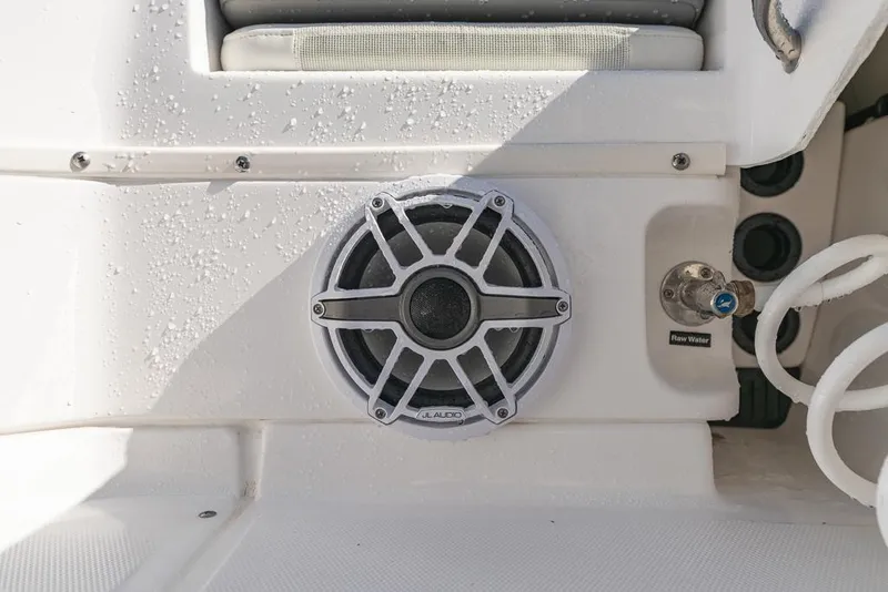 Slide: The Image of Everglades 243cc Sport Station 2023 boat speaker and water hose detail. - 39
