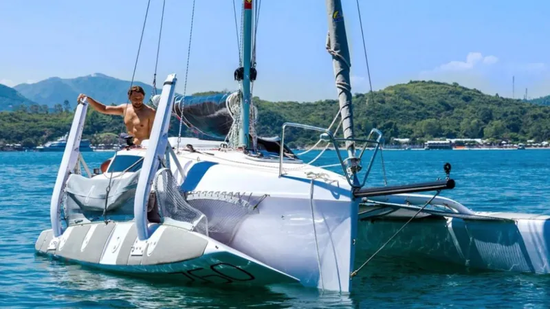 Slide: The Image of Sleek Corsair 760 trimaran sailing in scenic waters, 2025 model. - 4
