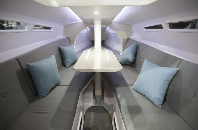 Slide: The Image of Interior of 2025 Corsair 760 sailboat with modern seating and cushions. - 5