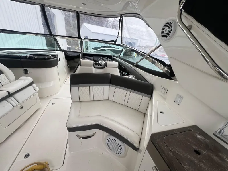 Slide: The Image of Luxurious interior of 2018 Sea Ray SLX 350 boat with plush seating and modern design. - 15