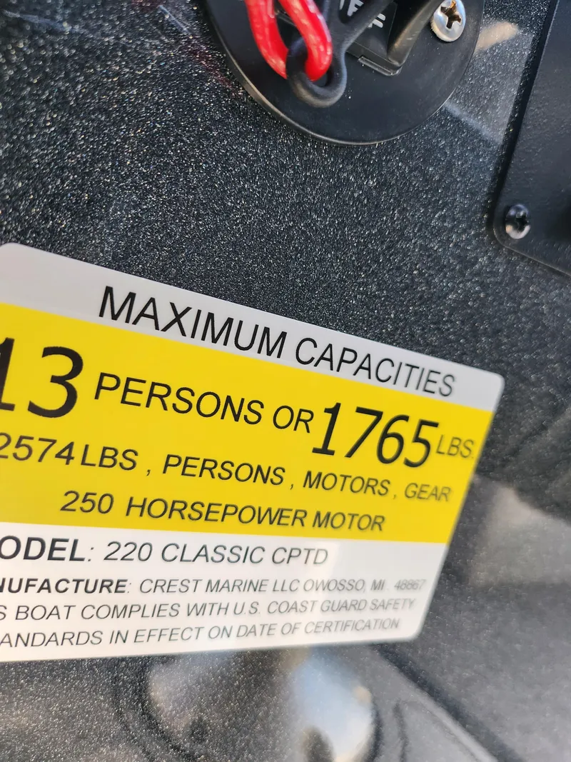 Slide: The Image of 2024 Crest Classic Platinum 220 capacity label, 13 persons or 1765 lbs, 250 horsepower motor. - 16