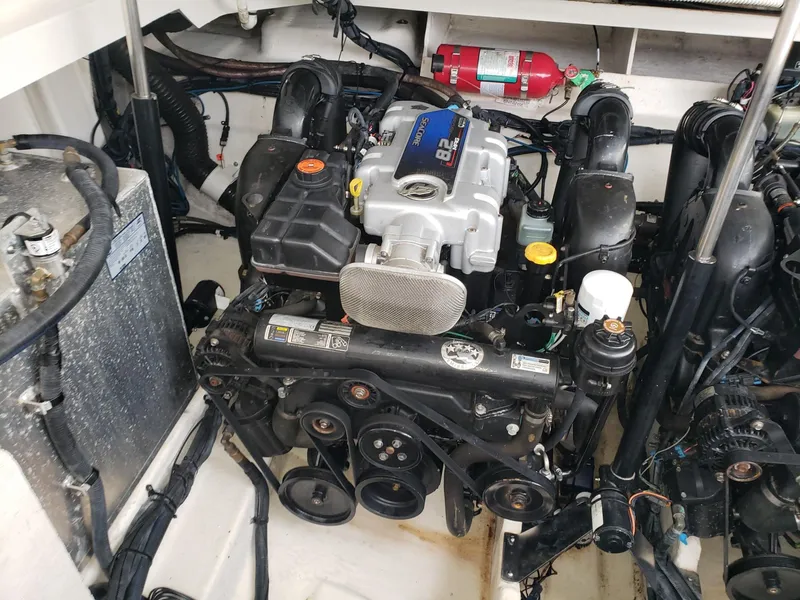 Slide: The Image of Engine compartment of a 2011 Sea Ray 350 Sundancer boat. - 28