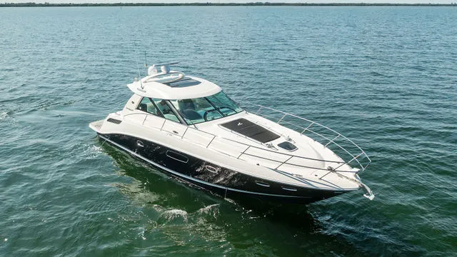 Slide: The Image of Control panel display on a 2011 Sea Ray 350 Sundancer boat dashboard. - 35