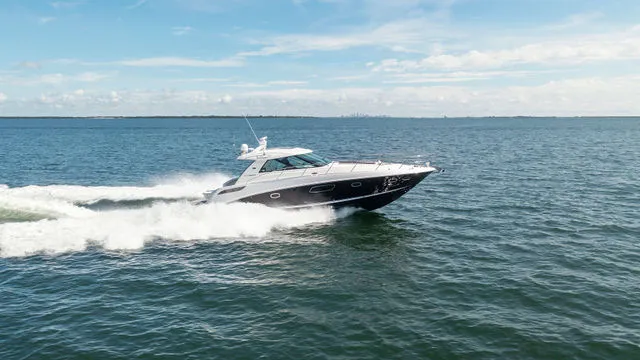 Slide: The Image of Engine compartment of a 2011 Sea Ray 350 Sundancer boat. - 38