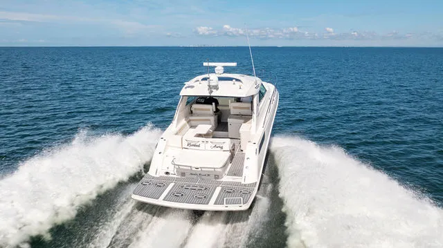 Slide: The Image of Engine compartment of a 2011 Sea Ray 350 Sundancer with batteries and wiring. - 41