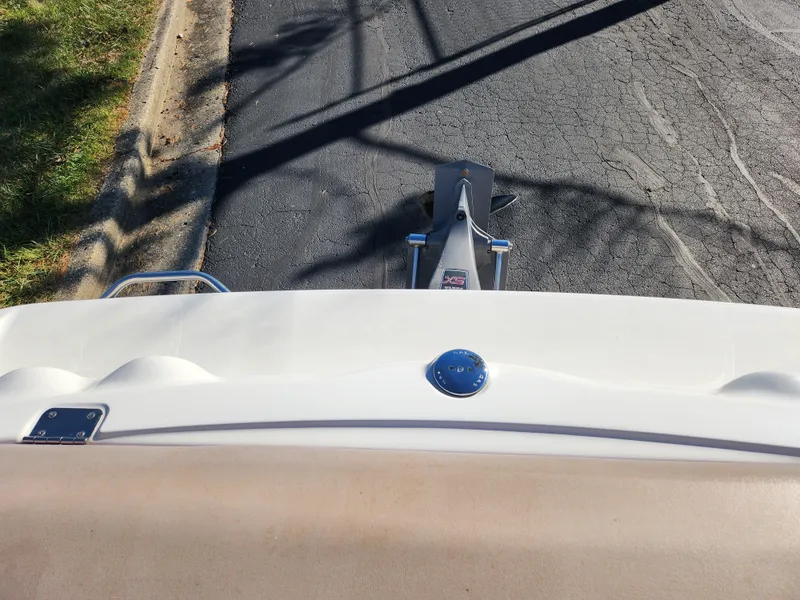 Slide: The Image of Top view of a 2003 Larson SEi 180 boat on a trailer. - 21
