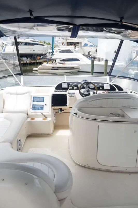 Slide: The Image of Interior view of 1999 Maxum 4100 SCR yacht at marina. - 5