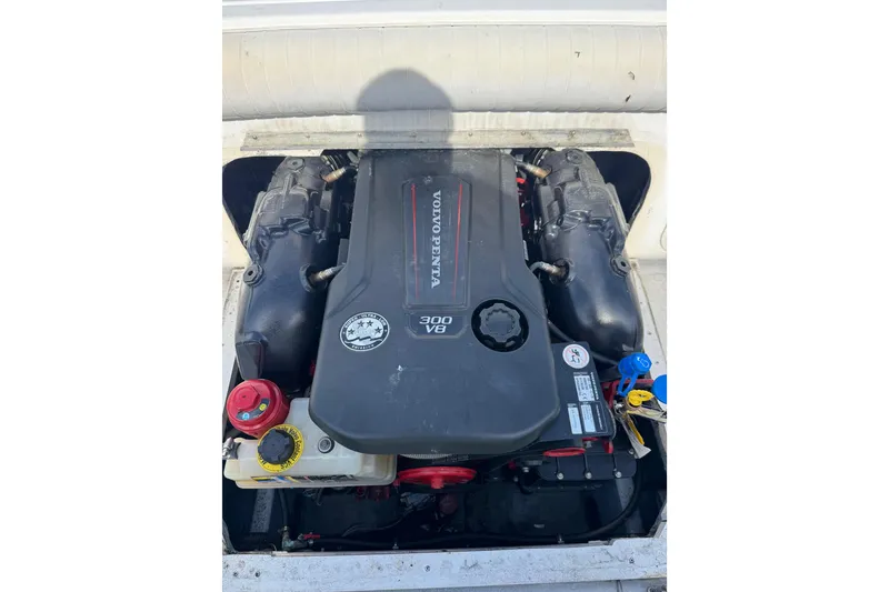 Slide: The Image of Volvo Penta engine in 1998 Sport-Craft 252 Sportfish boat, showcasing V8 power. - 8