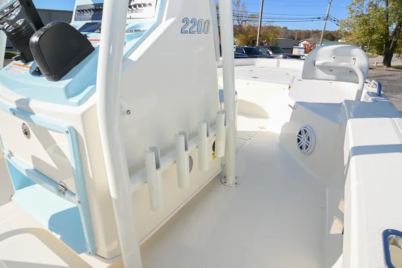 Slide: The Image of 2025 Pathfinder 2200 TRS boat interior with console and seating, showcasing modern design. - 21