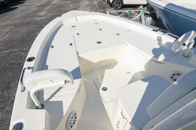 Slide: The Image of 2025 Pathfinder 2200 TRS boat interior with seating and storage compartments. - 24