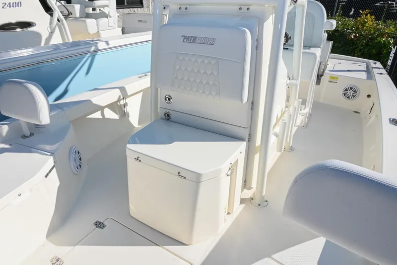 Slide: The Image of 2025 Pathfinder 2200 TRS boat interior with seating and storage features. - 26
