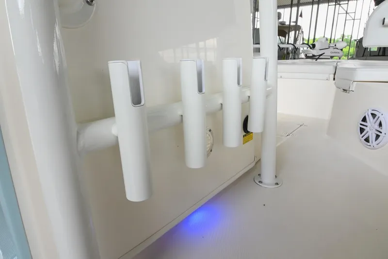 Slide: The Image of 2025 Pathfinder 2200 TRS boat rod holders with blue LED lighting. - 40