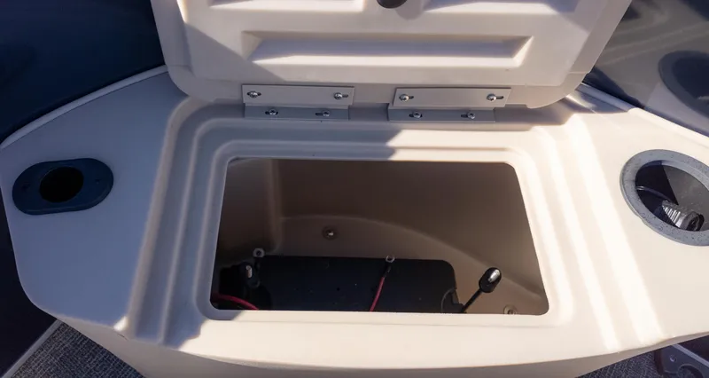 Slide: The Image of Open storage compartment on 2025 Bennington 21SF boat. - 11