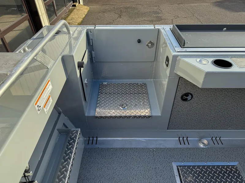 Slide: The Image of 2025 Hewescraft 210 Sea Runner ET boat interior with diamond plate flooring. - 17