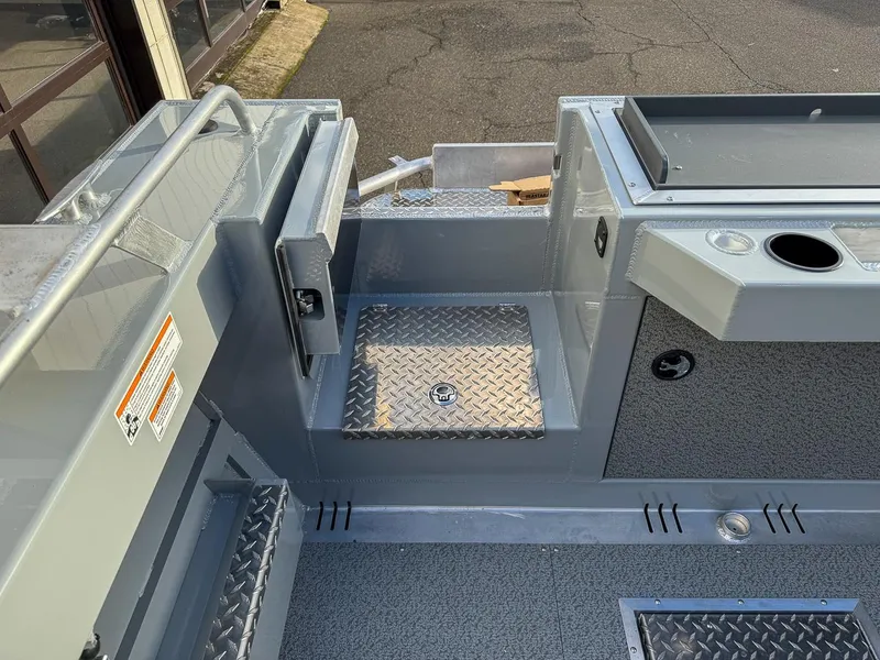 Slide: The Image of 2025 Hewescraft 210 Sea Runner ET boat interior with diamond plate flooring. - 18