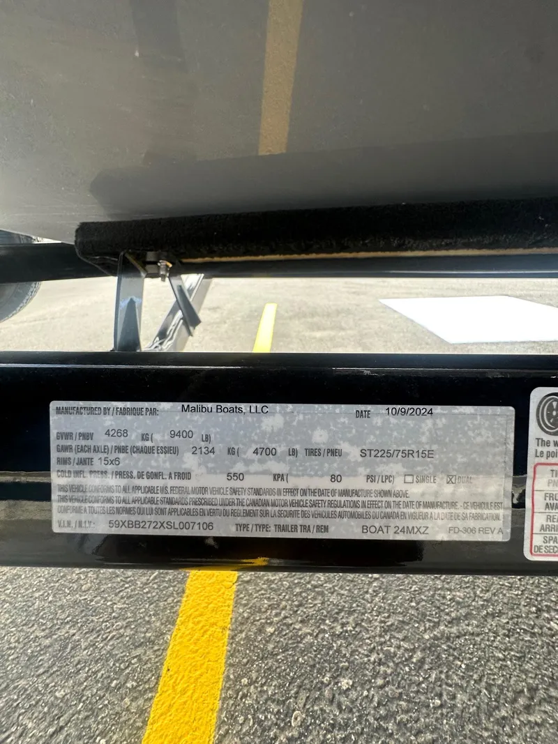 Slide: The Image of Label on 2025 Malibu 24 MXZ boat trailer, showing specifications and manufacturing details. - 23