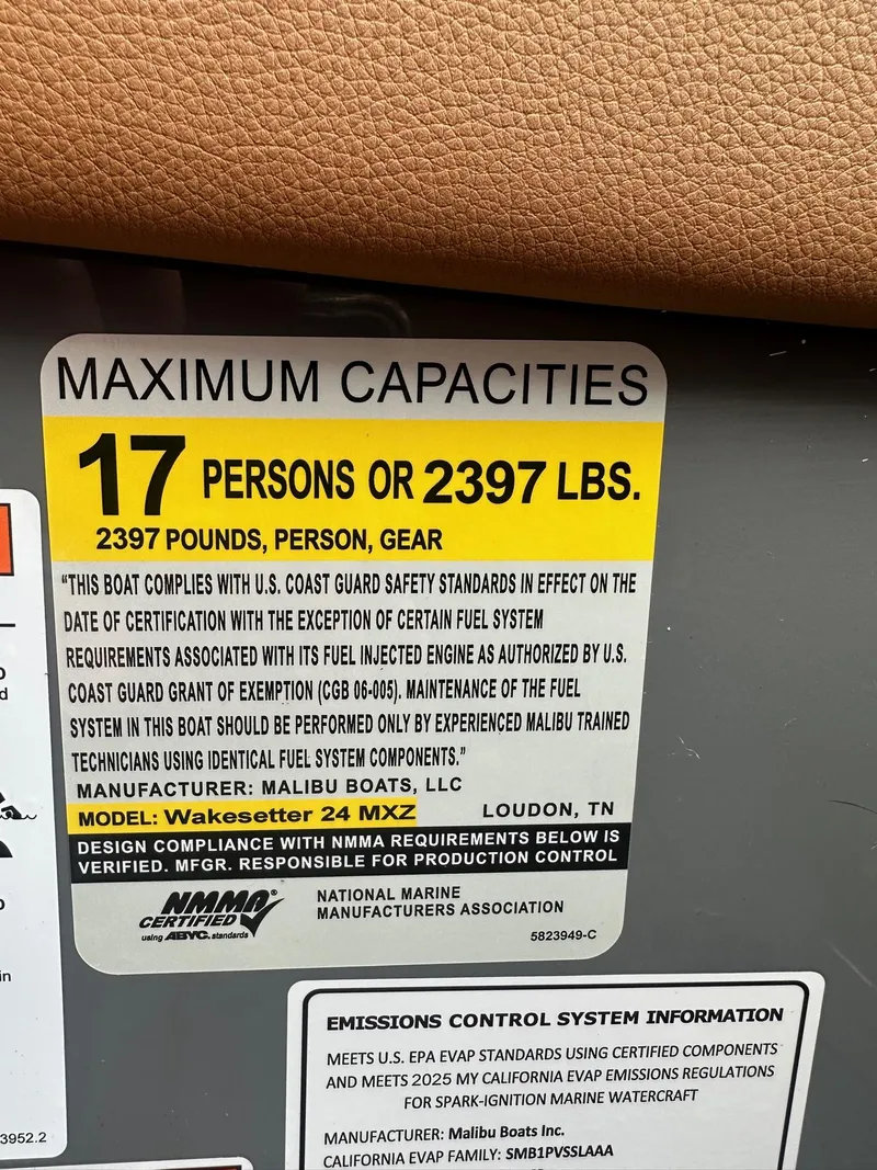 Slide: The Image of 2025 Malibu 24 MXZ capacity label: 17 persons or 2397 lbs, safety compliance details. - 24
