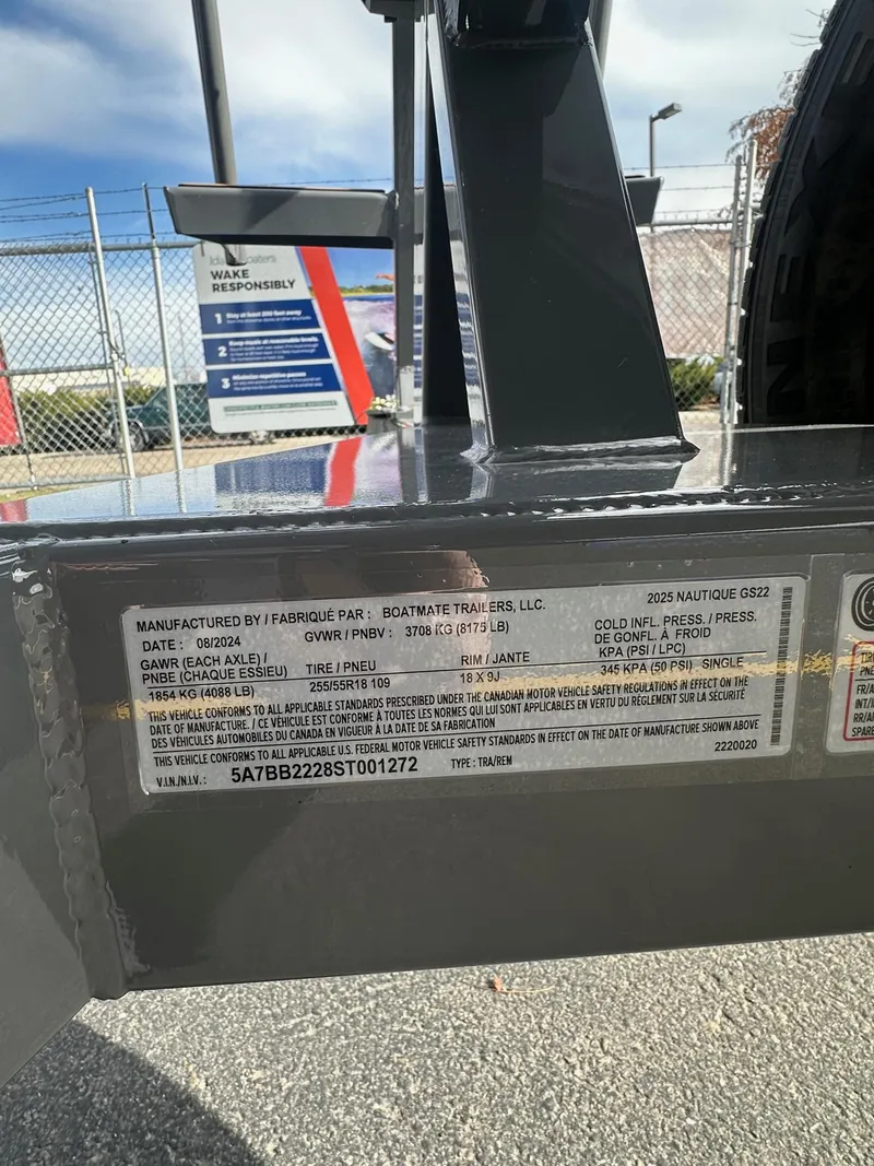Slide: The Image of Label on 2025 Nautique GS22 trailer, detailing specifications and compliance information. - 22