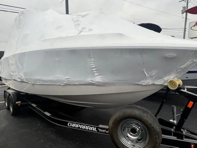 Slide: The Image of 2020 Chaparral 257 SSX boat covered on trailer, ready for transport. - 17
