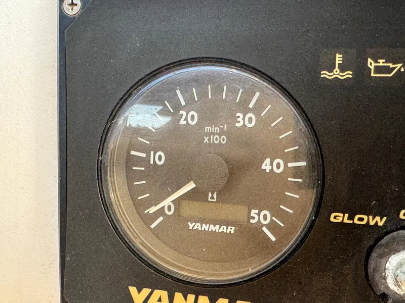 Slide: The Image of Yanmar tachometer on 2001 Lagoon 410, displaying engine RPM. - 28