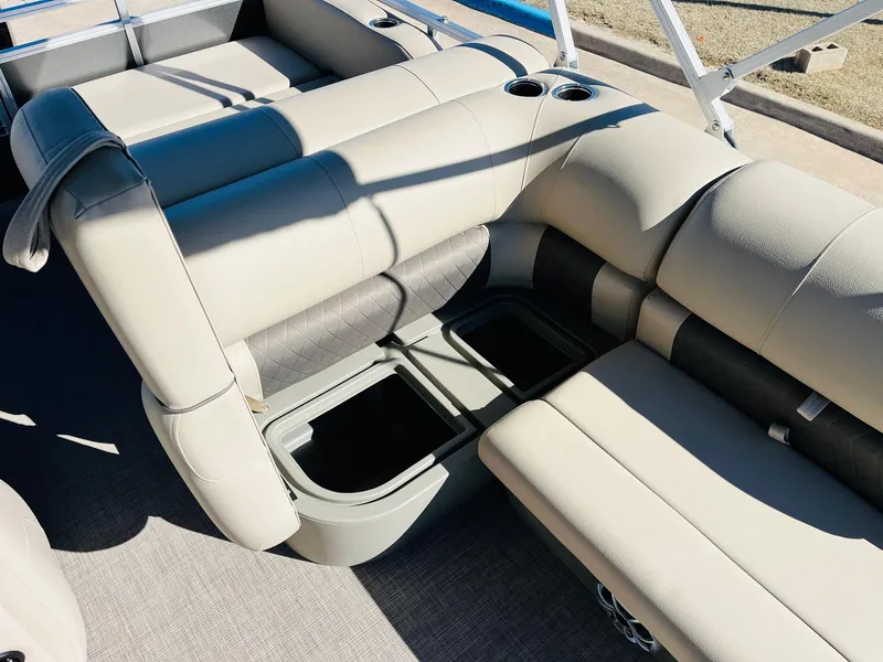 Slide: The Image of 2025 Sun Tracker Party Barge 22 RF XP3 interior seating with storage compartments. - 28