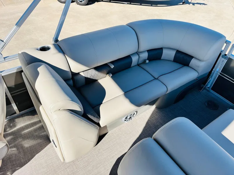 Slide: The Image of 2025 Sun Tracker Party Barge 22 RF XP3, luxurious seating area with cup holder. - 35