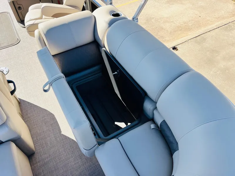 Slide: The Image of 2025 Sun Tracker Party Barge 22 RF XP3 with open storage compartment. - 40