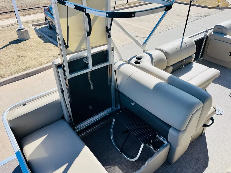 Slide: The Image of 2025 Sun Tracker Party Barge 22 RF XP3 interior with seating and storage. - 44