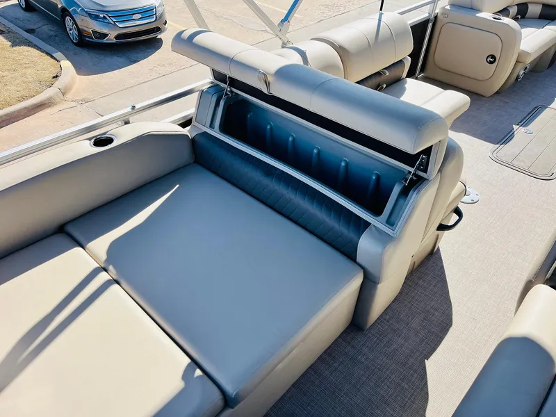 Slide: The Image of 2025 Sun Tracker Party Barge 22 RF XP3 interior seating with storage compartment. - 45