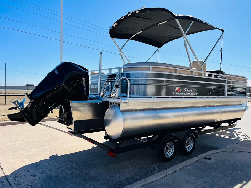 Slide: The Image of 2025 Sun Tracker Party Barge 22 RF XP3 pontoon boat with canopy on trailer. - 5