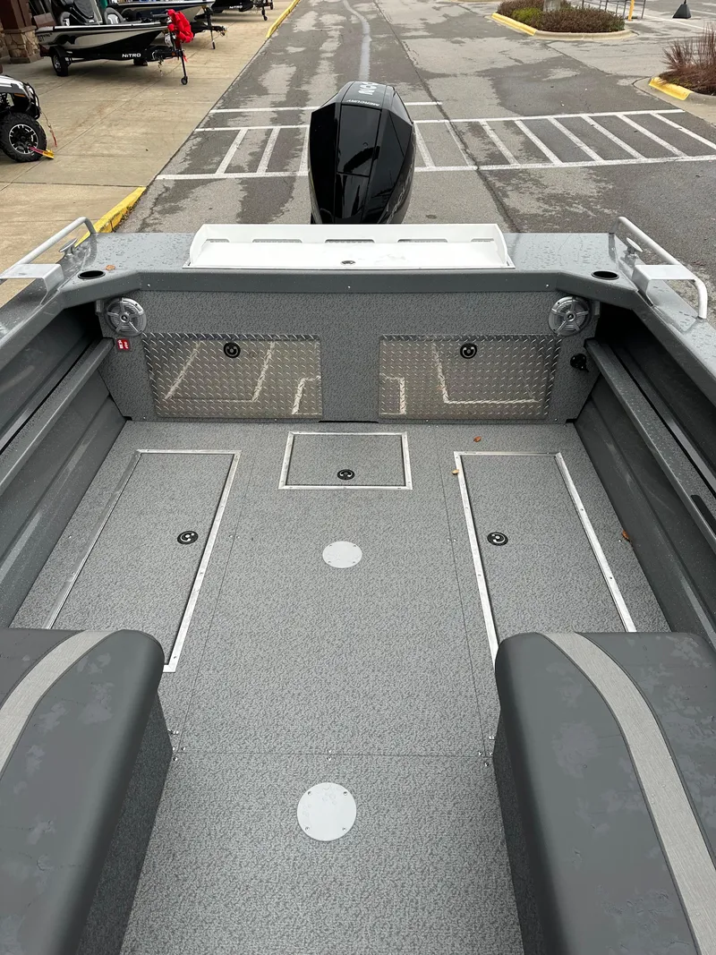 Slide: The Image of 2025 Spartan 200 Astoria boat interior with spacious seating and modern design. - 18