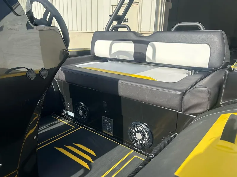 Slide: The Image of Interior of 2025 Highfield Velox 420 boat with modern seating and speakers. - 5