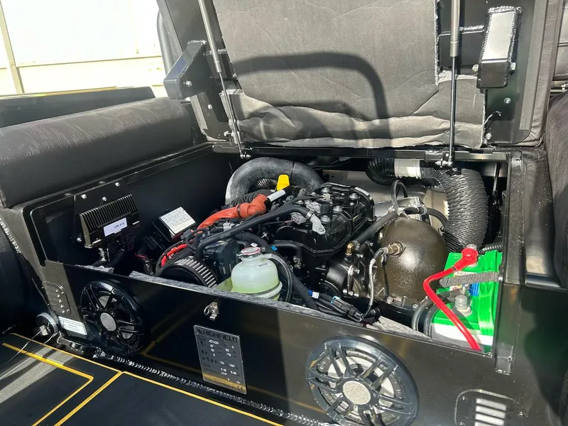 Slide: The Image of 2025 Highfield Velox 420 engine compartment with visible components and wiring. - 6