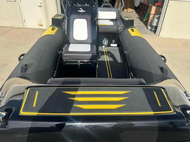Slide: The Image of 2025 Highfield Velox 420 boat interior with black and yellow design. - 7