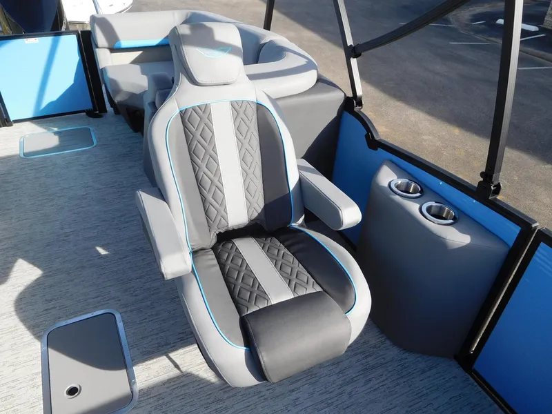 Slide: The Image of Luxurious seating on 2025 Bennington 24 MFB boat with cup holders and modern design. - 4