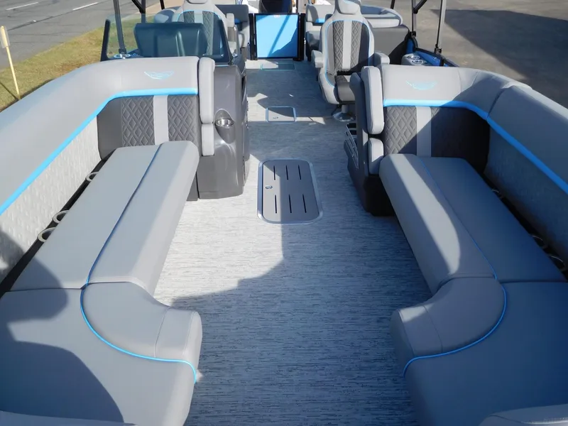 Slide: The Image of 2025 Bennington 24 MFB pontoon boat interior with spacious seating and modern design. - 5