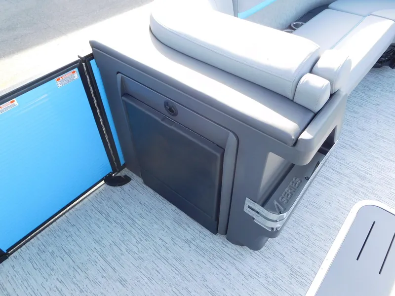 Slide: The Image of 2025 Bennington 24 MFB boat interior with seating and storage compartment. - 7