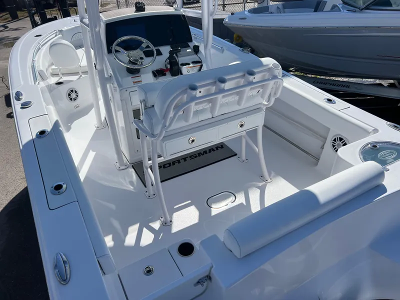 Slide: The Image of 2024 Sportsman Open 212 Center Console boat interior with steering console and seating. - 4