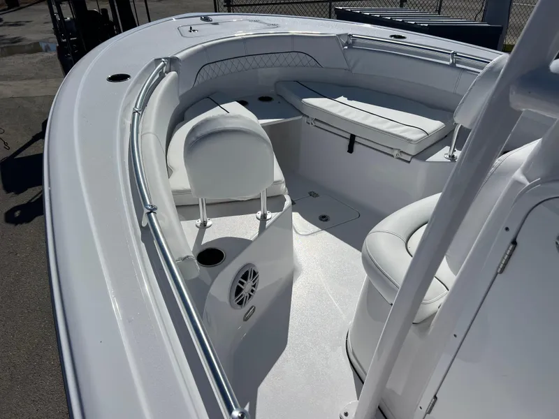 Slide: The Image of 2024 Sportsman Open 212 Center Console boat interior with seating and console. - 9