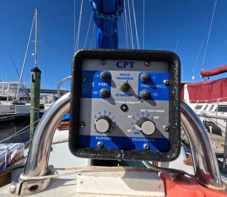 Slide: The Image of CPT autopilot control on 1972 Cheoy Lee Luders 36 sailboat, docked in marina. - 19