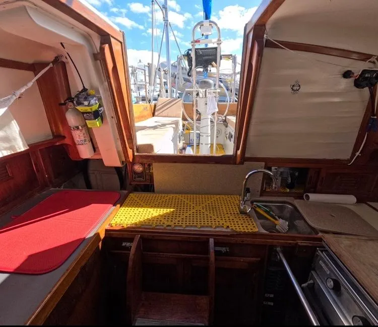 Slide: The Image of Interior of 1972 Cheoy Lee Luders 36 sailboat with kitchen and deck view. - 20