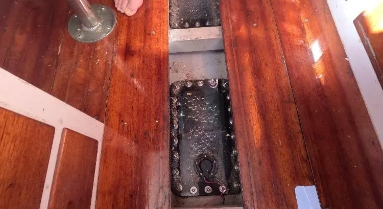 Slide: The Image of Wooden interior of 1972 Cheoy Lee Luders 36 sailboat, showing floorboards and metal fittings. - 26