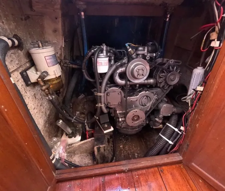 Slide: The Image of Engine compartment of 1972 Cheoy Lee Luders 36 sailboat, showing detailed mechanical components. - 41