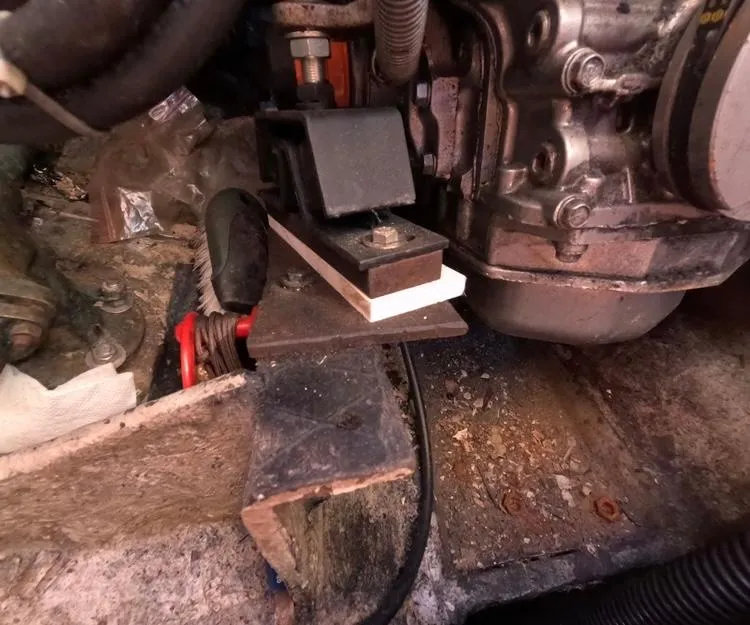 Slide: The Image of Engine compartment of a 1972 Cheoy Lee Luders 36 sailboat, showing mechanical components. - 43